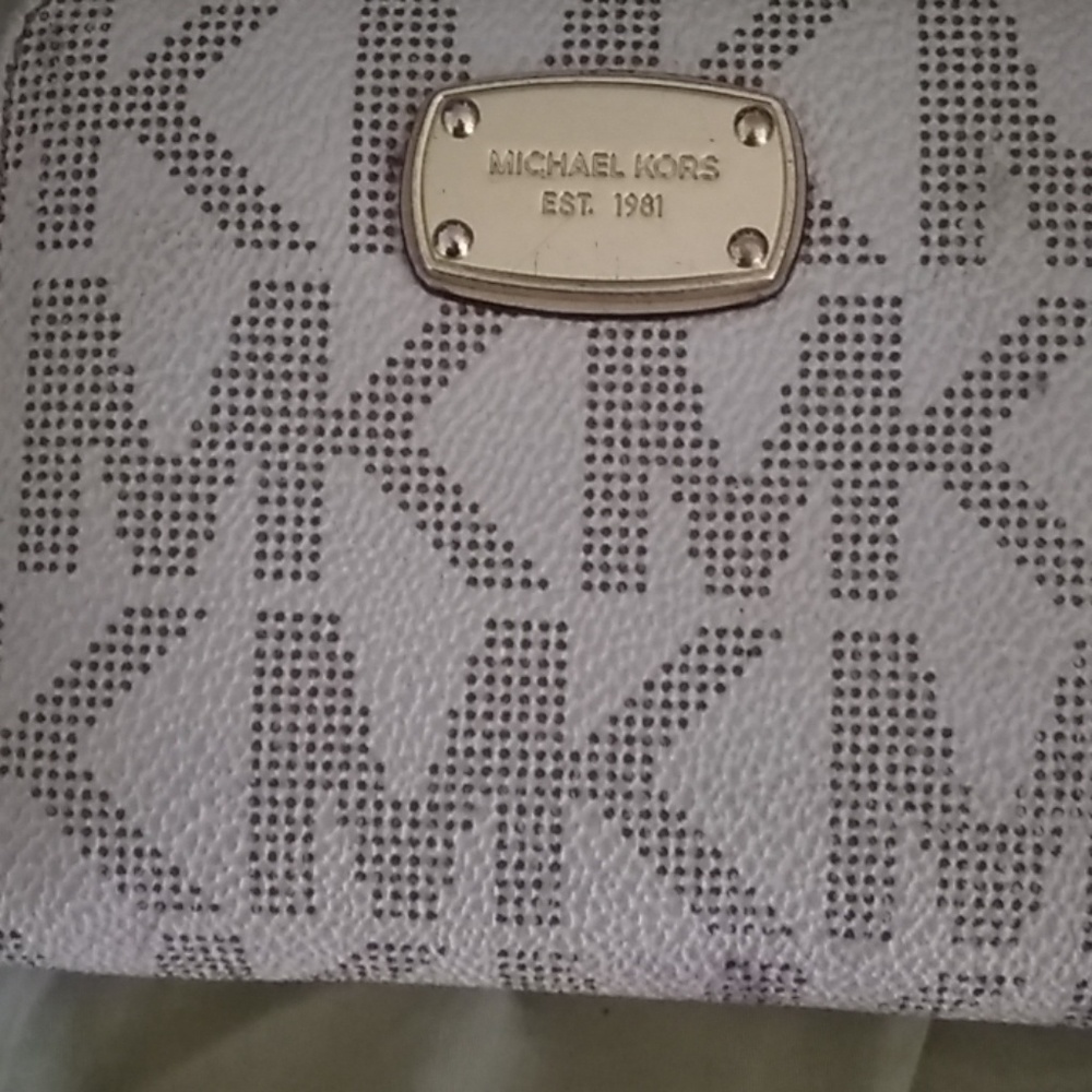 Michael kors wallet has some imperfections, SOLD!